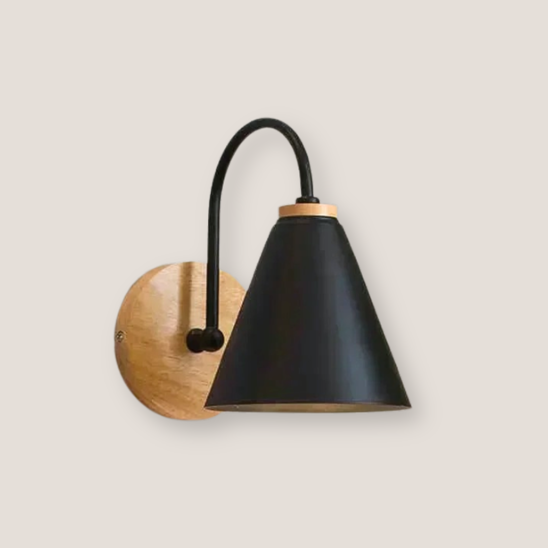 Wall-mounted light fixture with black cone shade and wooden base on a beige background