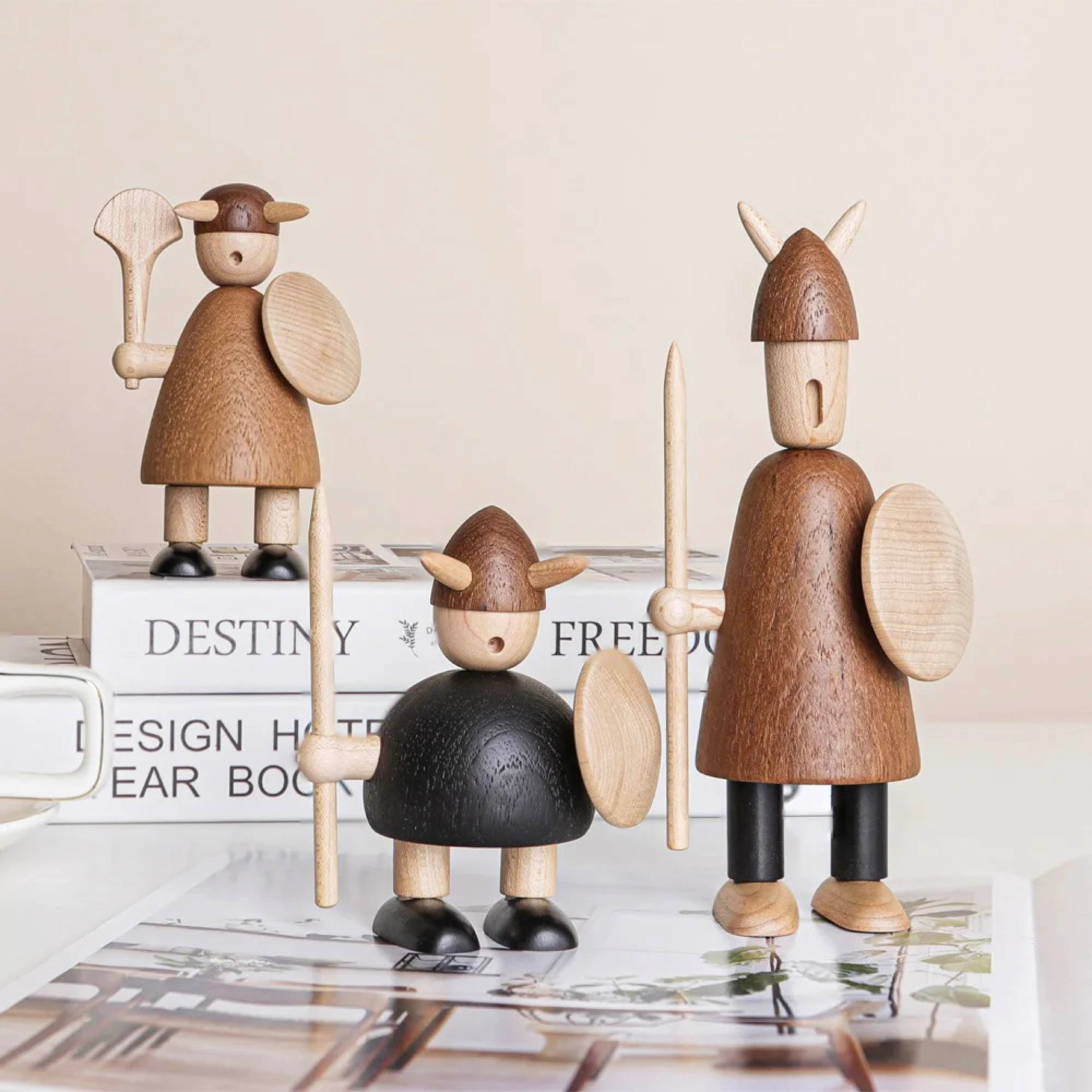 Wooden Viking figurines styled with different poses on a tabletop as home decor accents