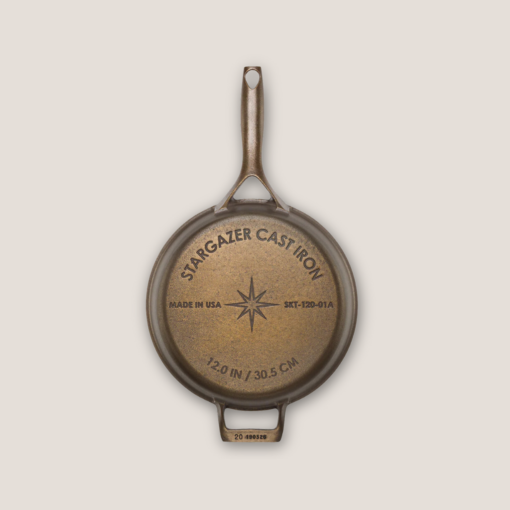 Back view of 12-inch cast iron skillet featuring Stargazer logo embossed on the base