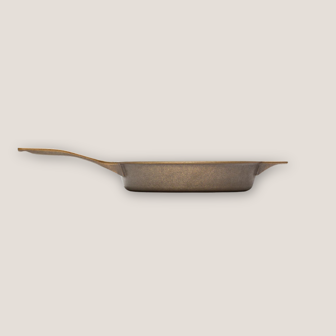 Full side profile of 12-inch cast iron skillet showing outer wall, base, and handle