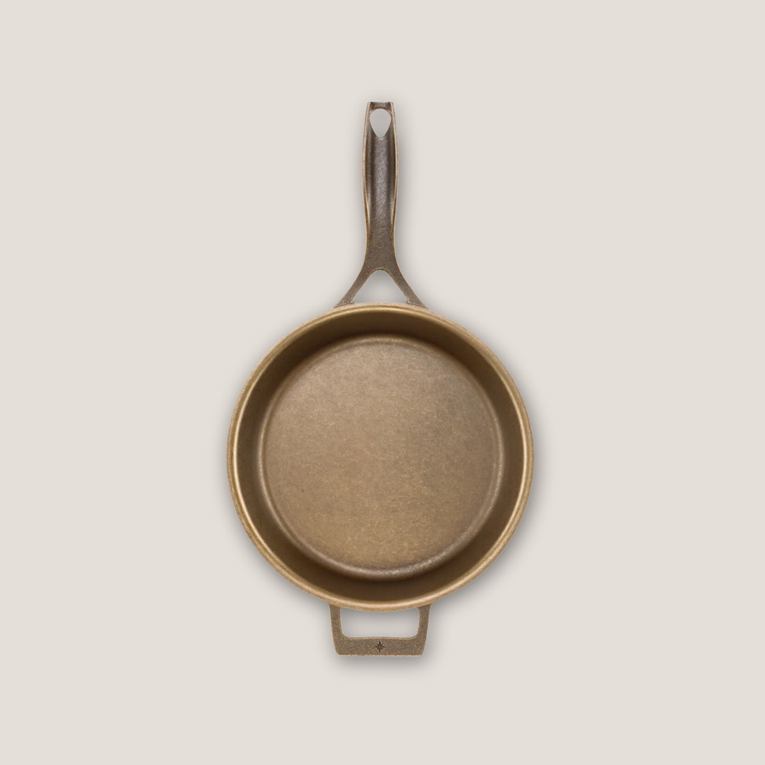 Top-down view of 12-inch cast iron skillet showing wide cooking surface and dual handles