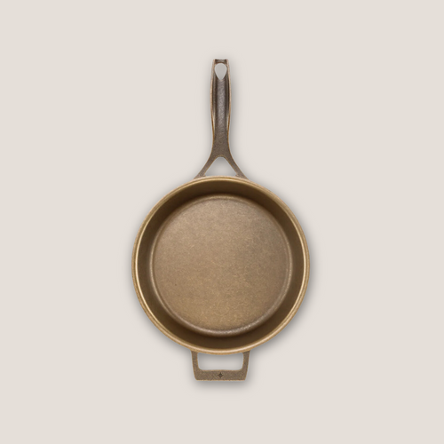 Top-down view of 12-inch cast iron skillet showing wide cooking surface and dual handles