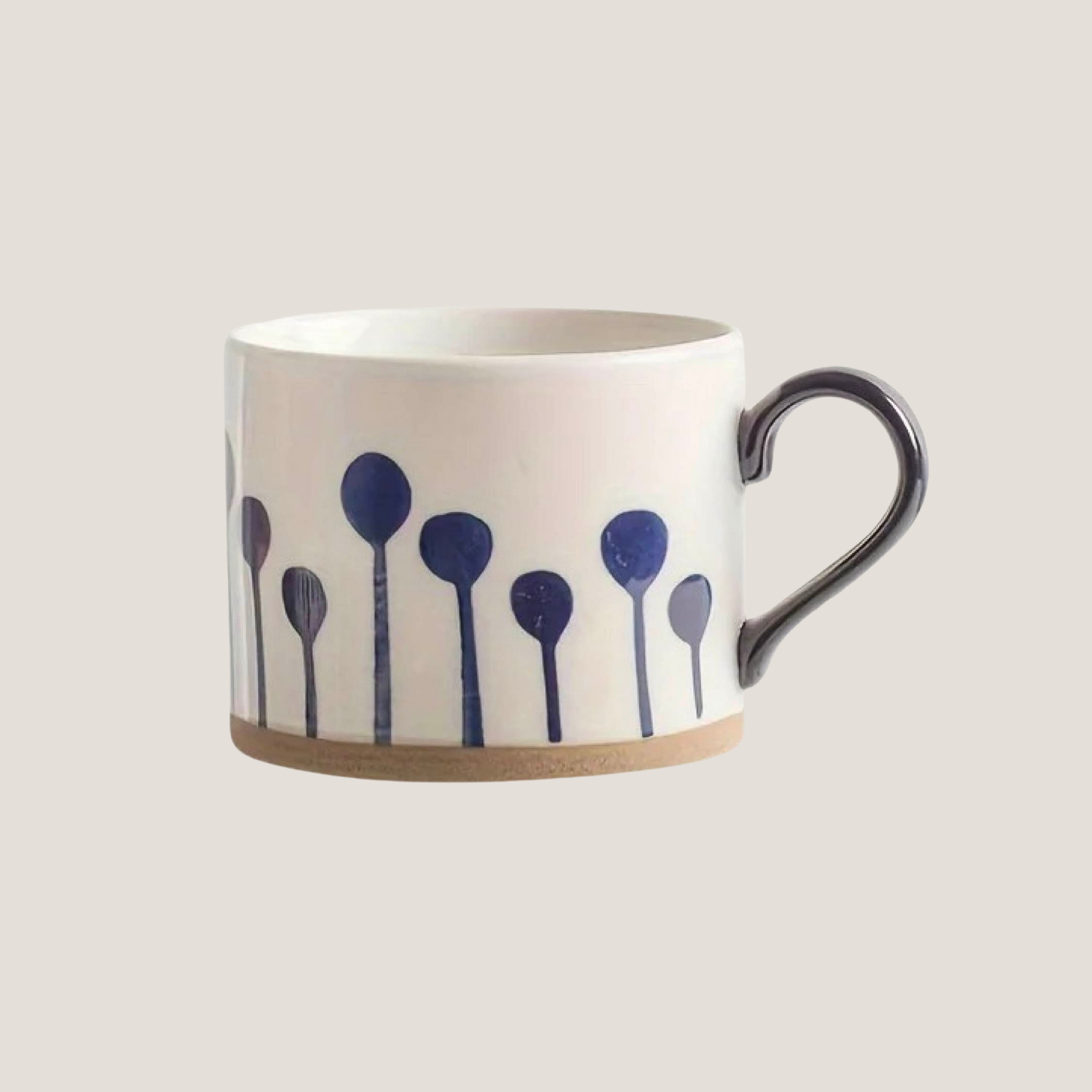 Blue watercolor stroke ceramic mug with dandelion design, displayed individually