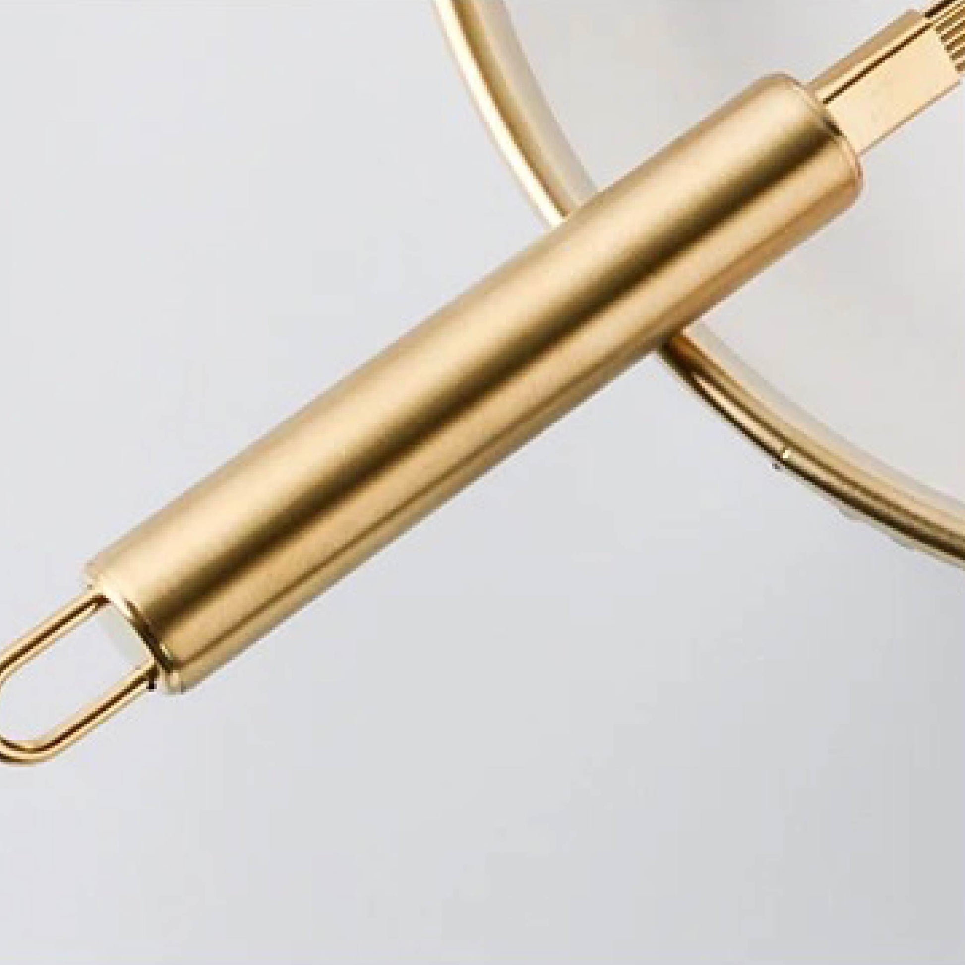 Close-up of the gold stainless steel handle with sleek polished finish