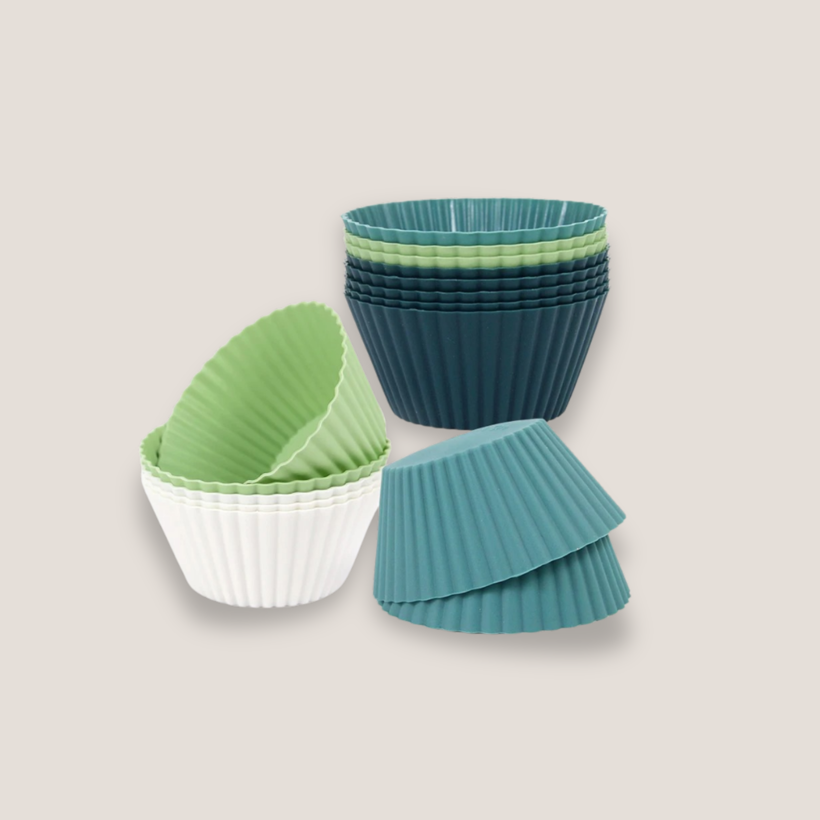 Set of 12 silicone muffin baking cups in white, light green, dark green, and blue displayed together on a light background
