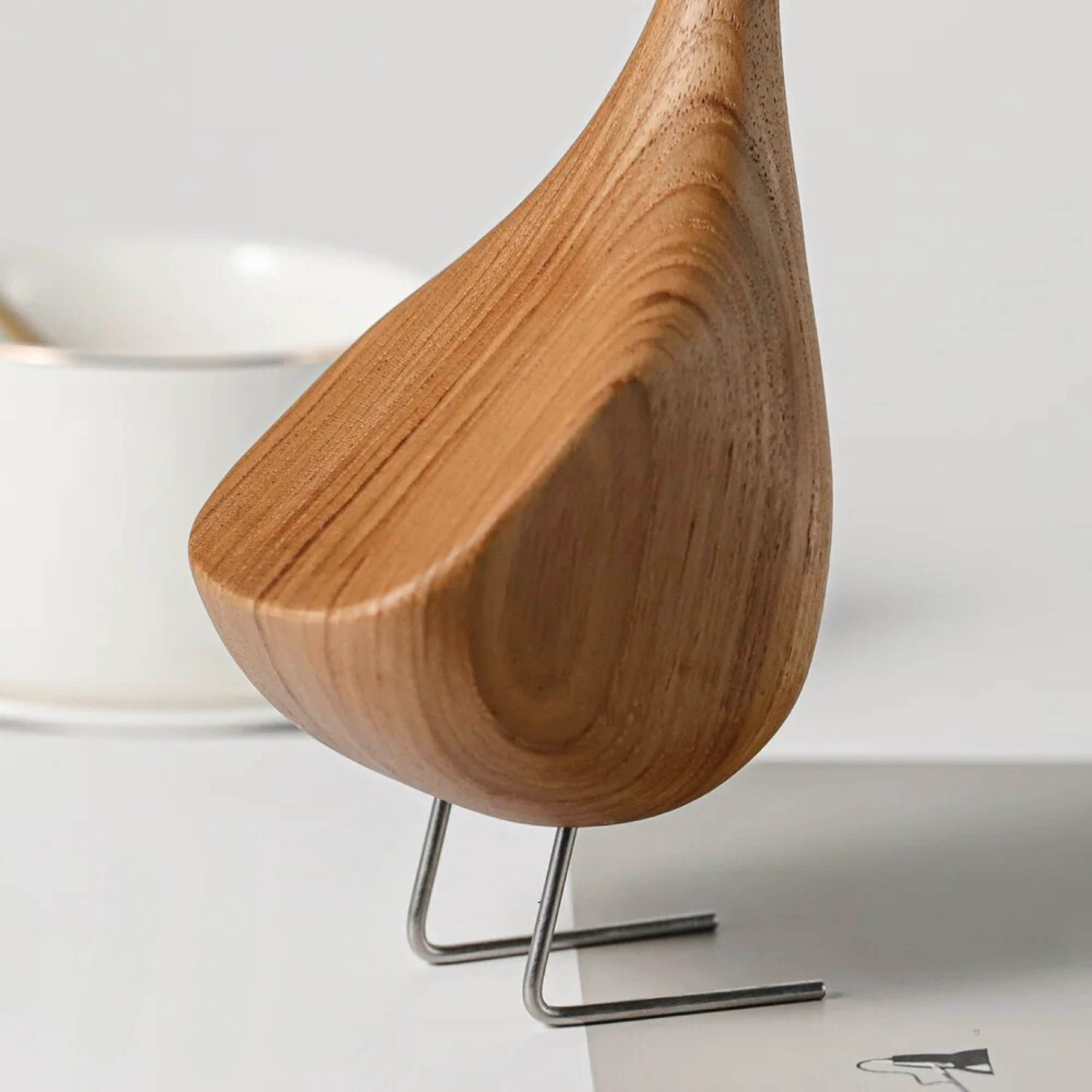 Close-up of wooden goose figurine body